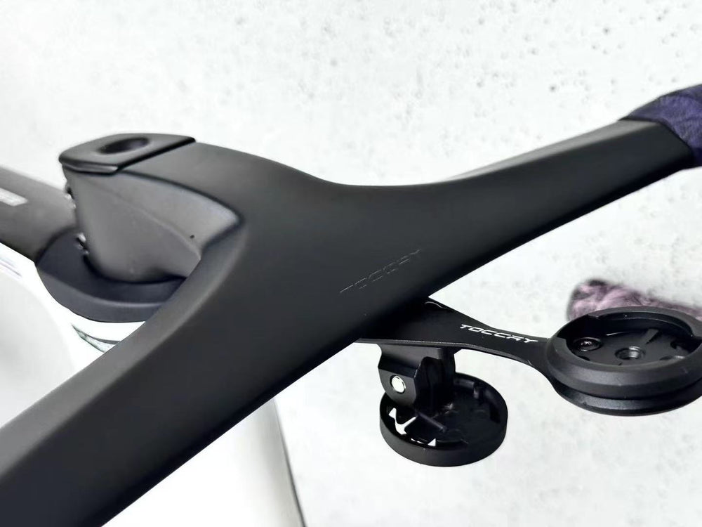 Close up of TOCCAY out-front computer mount on integrated carbon cockpit