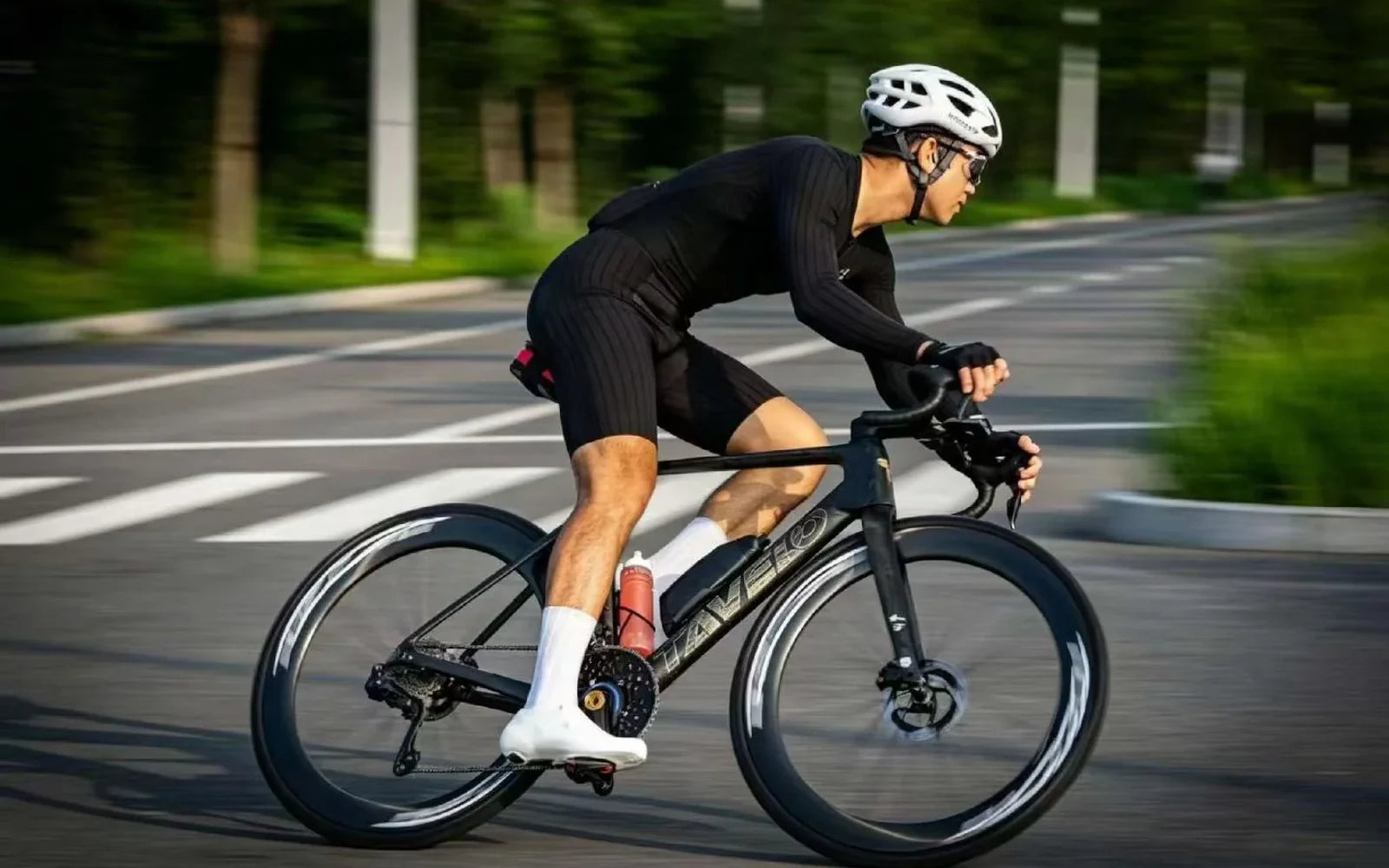 Road cyclist riding at pace