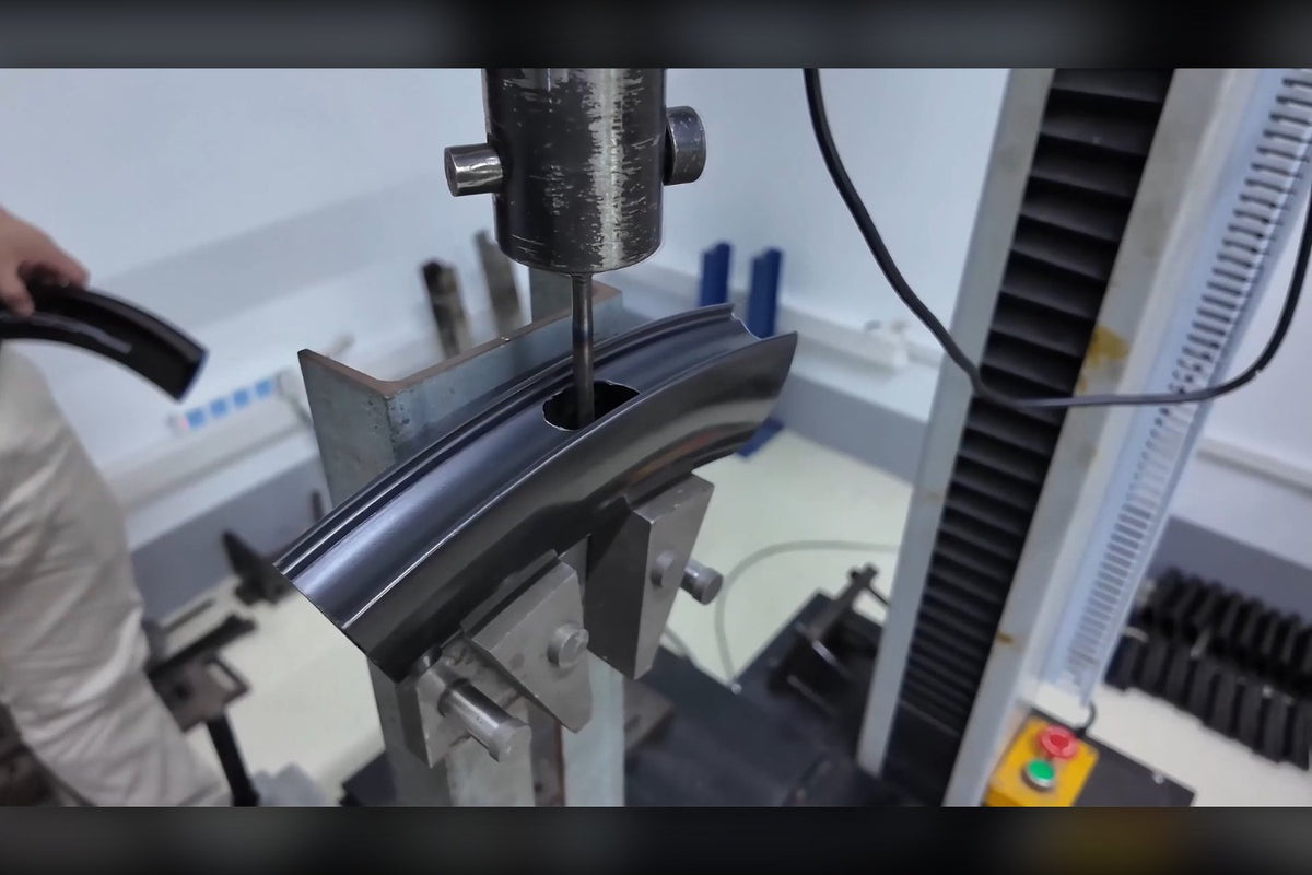 TOCCAY spoke-hole pull test on the load fixture